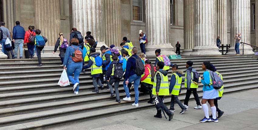 Students entering a museum